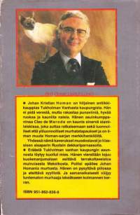 Demonit, 1982. 1.p. Yhdessä kaverukset Jan Homan ja hänen siamilaiskissansa muodostavat jo klassisen aisaparin Ruotsin dekkariparnassolla.
