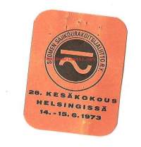 Suomen Sähköurakoitsijaliitto ry 28. kesäkokous Helsingissä 1973 -  rintamerkki pahvia