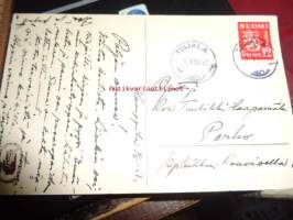 Postikortti v. 1951 isä ja poika lukevat