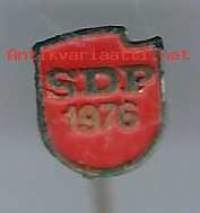 SDP 1976 neulamerkki -   rintamerkki