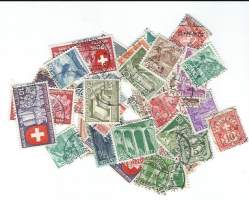 Sveitsiläisiä postimerkkejä n 50 kpl erä ulkomainen postimerkki