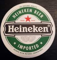 Heineken -olut lasin alunen, Heineken