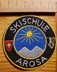 Skischule Arosa -kangasmerkki