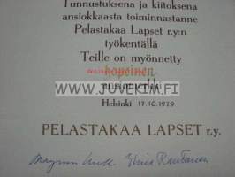 Pelastakaa Lapset ry hopeinen ansiomerkki Marjatta Koponen 1979 -myöntökirja