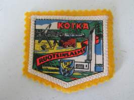Kotka -Ruotsinsalmi -kangasmerkki / matkailumerkki / hihamerkki / badge -pohjaväri keltainen