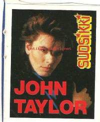 John Taylor, Suosikki - lehden  tarra  7x6 cm