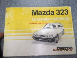 Mazda 323 -käyttöohjekirja