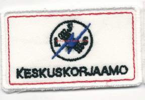 Keskuskorjaamo   -   hihamerkki