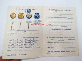 Uintikirja uintisuoritusmerkkeineen 1971-73