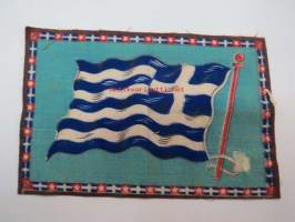 Sikarilippu Greece (Cigarr flag) -sikarilaatikossa kylkiäisenä tullut keräilyliina, ollut laatikon pohjalla sikarien alla, arviolta 1920-30 lukujen vaihteesta