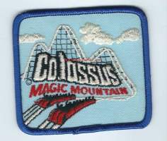 Colossus Magic Mountain - hihamerkki, matkailumerkki