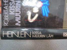 Kissa muurin läpi