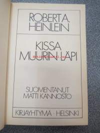 Kissa muurin läpi