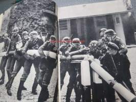 We have not forgotten - Nous N&amp;#180;avons pas oublié - Wir haben es nicht vergessen 1939-1945 -kolmikielinen Puolassa julkaistu tos toisen maailmansodan kulusta ja