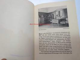 Deutsche Werkstätten GMBH Dresden - München, huonekalutehtaitten kuvallinen esittelykirjanen osasta huonekalutuotantoa, kansikuvitus A. Niemayer, ei täydellinen