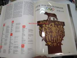 De Olympiske Lekers historia i tretten plakater 1912-1968 -Olympiakisojen julisteet jäljennöksinä (irtonaiset sellofaanilehden alla), julisteet kokoa 25 x 35 cm.