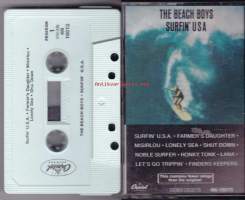 The Beach Boys - Surfin&#039; USA. Capitol re-issue. C-kasetti. CAPITOL 4N 16015.  Sisältää vähemmän raitoja kuin alkuperäinen. “Stoked” and “Surf Jam”
