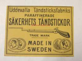 Uddevalla Tändsticksfabricks paraffinerade Säkerhets Tändstickor-tulitikkuetiketti (Ruotsissa valmistettu)