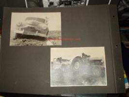 Auto VC-97  juuttunut mutaan ja traktorilla hinaus sekä maisema valokuva
