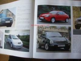The Encyclopedia of Cars by Peter Henshaw 2003 - kirja painaa 3,1 kg ja maksaa uutena 290 Dollaria
