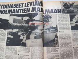 UM Uusi Maailma 1977 nr 14, ilmestynyt 20.7.1977, sis. mm. seur. artikkelit / kuvat / mainokset; Kansikuva Tii Heilimo, Kaustisen kansanmusiikkijuhlat + Konsta