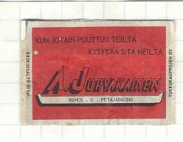 A. Jurvakainen Muhos -  tulitikkuetiketti  alustalla