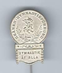 Skånes Gymnastikförbund  rintaneula - rintamerkki