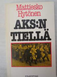 AKS:n tiellä