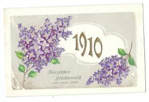 Onnellista Uutta Vuotta 1910 - uudenvuodenkorttiikortti postikortti kohopaino kulkenut nyrkkipostissa