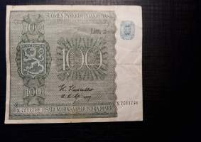 Suomen Pankki 100 markkaa 1945 Litt.B. valmistuserä 1952, allekirjoitukset K.Kivialho ja U.Kilpinen, sarjanumero X7011746