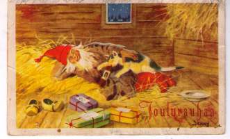 Jenny Nyströn. Kissa  ja  tonttu  alkoivat  joulu levon.