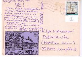 Hevoskortti. Kaksi  hevosta  käyskentelee  laitumella