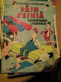 Ohukainen ja Paksukainen lahjakirja  päin seiniä 1982