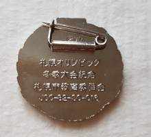 Sapporo 1972 Olympialaisten rintamerkki.