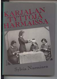 Karjalan tyttöjä harmaissa