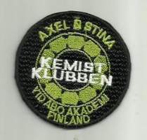 Kemist klubben -   hihamerkki