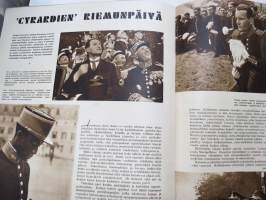 Kuva 1939 nr 4, Hiihtomajoja Helsingin liepeillä, Helmikuun manifesti, Göring &amp; Kustaa, Suurta maailmanteatteria, Paavi - Sielujen valtias, Sonja Henie,  Saint-Cyr