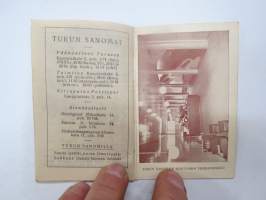 Turun Sanomain onnenkalenteri 1936, kannessa olympiarenkaat, sisäkansissa toimitalokuvat -calendar