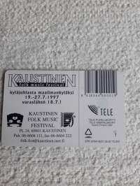 Puhelinkortti : kyläjuhlasta maailman  kyläksi. Kaustinen folk musik festival 1997.Kansanperinnettä  tai musikkitapahtumia keräävälle mukava lisä