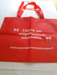 Suomalainen kirjakauppa / kuitukangas kassi. Käyttämätön. Koko: leveys 50 c, korkeus 40 cm, hihna 58 cm.