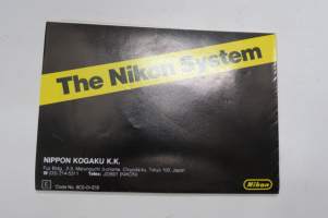 The Nikon System - kamerat ja objektiivit yms. -esite, englanninkielinen / brochure, cameras and accessories