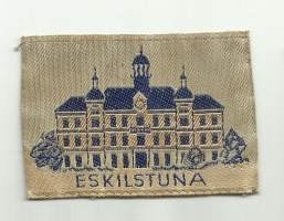 Eslilstuna -  vanha hihamerkki, matkailumerkki  kangasmerkki