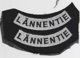 Lännentie -   hihamerkki