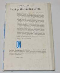Lapinpoika hiihtää kotiin