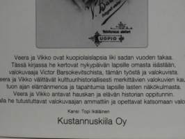 Koira ateljeessa ja muita vanhoja valokuvia