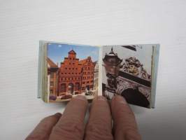 Coynty of Rostock -miniatyyrikokoinen kirja,silloisen Itä-Saksan Rostockin alueen esittelyä, englanninkielinen