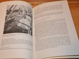 Cargo access equipment for merchant ships
