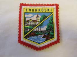 Enonkoski -kangasmerkki / matkailumerkki / hihamerkki / badge -pohjaväri punainen