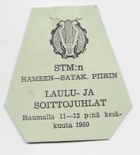 Suomen Työväen Musiikkiliitto ry (STM)  Soitto- ja Laulujuhlat  Rauma  1960-  rintamerkki  pahvia