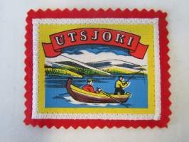 Utsjoki -kangasmerkki / matkailumerkki / hihamerkki / badge -pohjaväri punainen